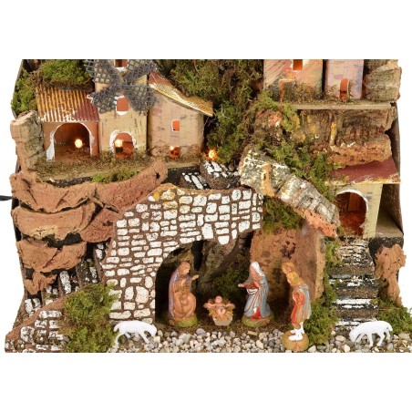 Natividad iluminada completa con estatuas Landi con pueblo y
