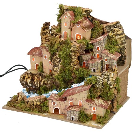 Illuminated landscape with stream and village in the distance