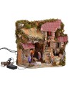 Illuminated nativity scene complete with Landi statues and fountain