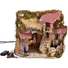 Illuminated nativity scene with functioning fountain and