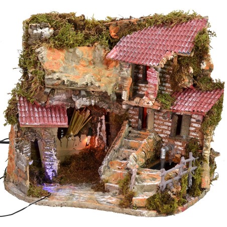 Illuminated nativity scene with working fountain and night effect