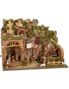 Illuminated nativity scene complete with Landi statues and water mill