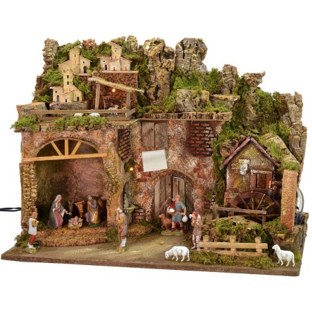 Illuminated nativity scene complete with Landi statues with