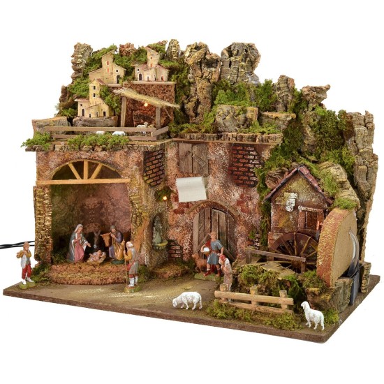 Illuminated nativity scene complete with Landi statues and water mill