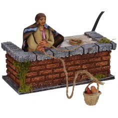 Mujer 10 cm en el balcón con canasta en movimiento Mundo Pesebres 2