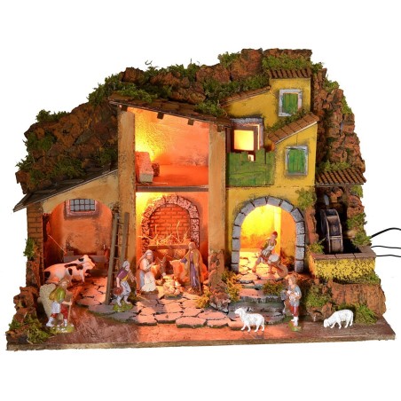 Illuminated nativity scene complete with Landi statues with