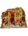Illuminated nativity scene complete with Landi statues and water mill