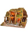 Illuminated nativity scene complete with Landi statues and water mill