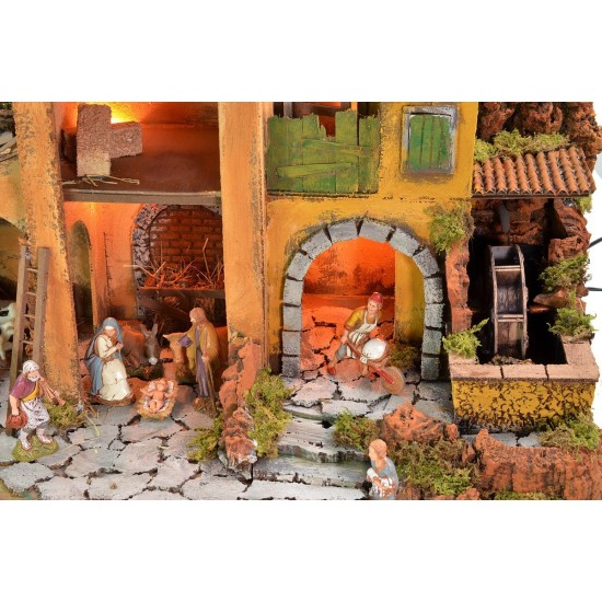 Belén iluminado completo con estatuas Landi y molino de agua
