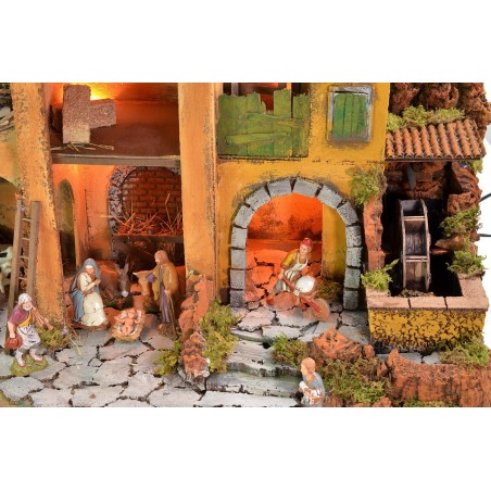 Belén iluminado completo con estatuas Landi y molino de agua