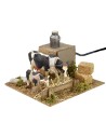 Vacas en movimiento en el pesebre cm 15x15,5x10 h Mundo