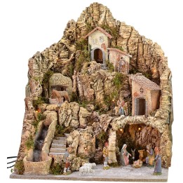 Pesebre iluminado con burro en el molino completo con estatuas