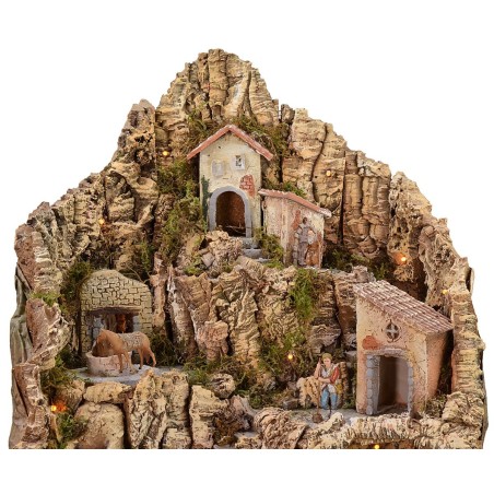 Illuminated nativity scene with grinded donkey complete with