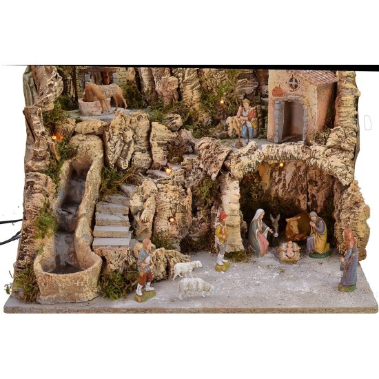 Illuminated nativity scene with grinded donkey complete with