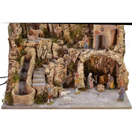 Presepe illuminato con asino alla macina completo di statue