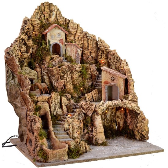 Illuminated nativity scene with working waterfall and donkey at the millstone