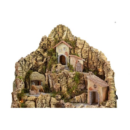 Illuminated nativity scene with functioning waterfall and donkey at the millstone