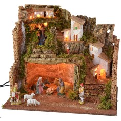 Illuminated nativity scene complete with Landi statues with 2