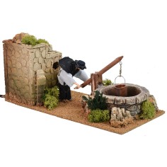 Man at the well in motion 12 cm 2