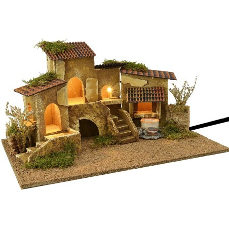 Grupo de casas con pozo iluminadas por corriente de 47x32x24,5