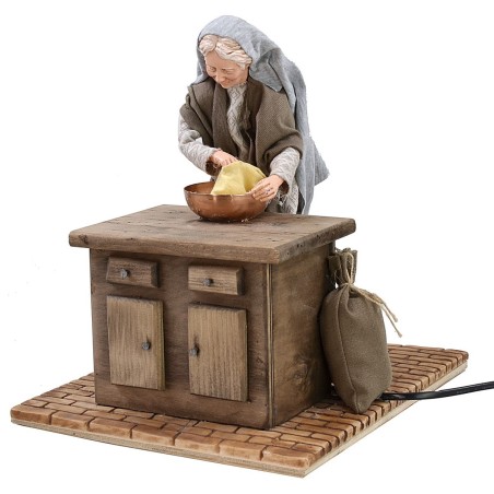 Donna palestinese che impasta in movimento 30 cm Mondo Presepi