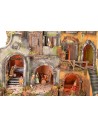 Illuminated Neapolitan nativity scene complete with Landi statues