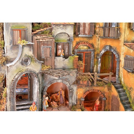 Illuminated Neapolitan nativity scene complete with Landi statues
