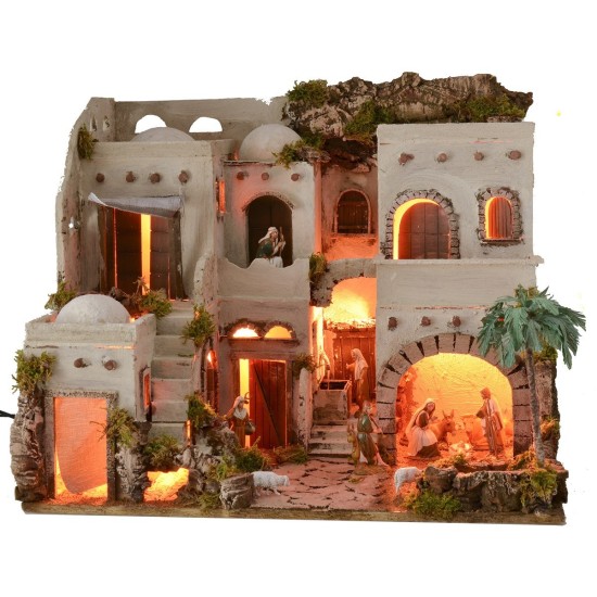 Illuminated Arab nativity scene with functioning fountain
