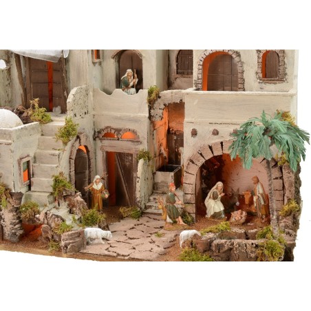 Illuminated Arab nativity scene with functioning fountain