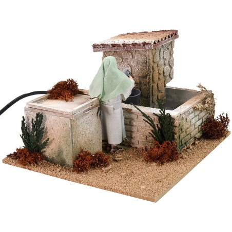 Mujer en la fuente 12 cm en movimiento cm 20x20x13,5 h Mundo