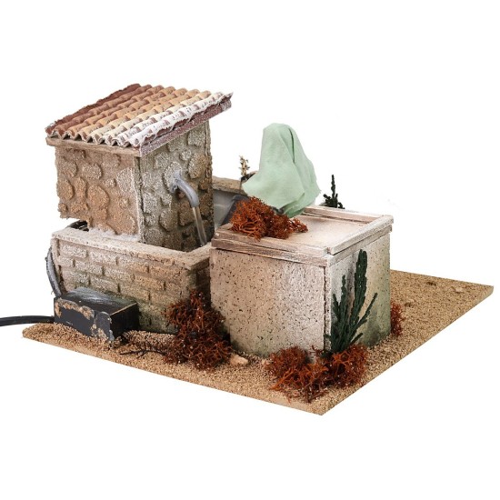 Donna alla fontana 12 cm in movimento cm 20x20x13,5 h Mondo