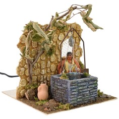 Woman at the well 10 cm in motion 18x20x21 cm h