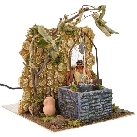 Donna al pozzo 10 cm in movimento cm 18x20x21 h Mondo Presepi