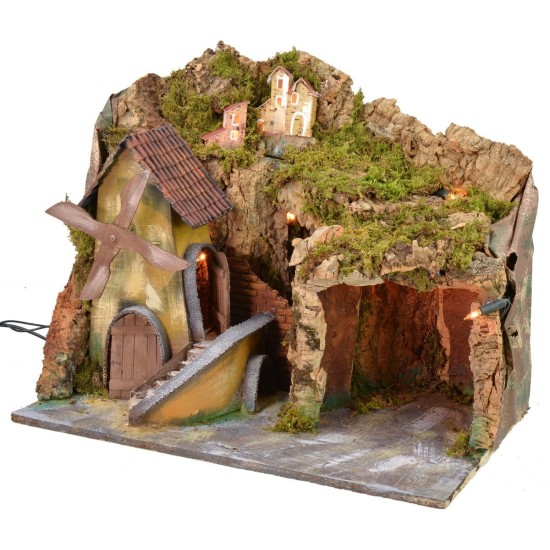 Classic illuminated landscape with grotto and mill running on