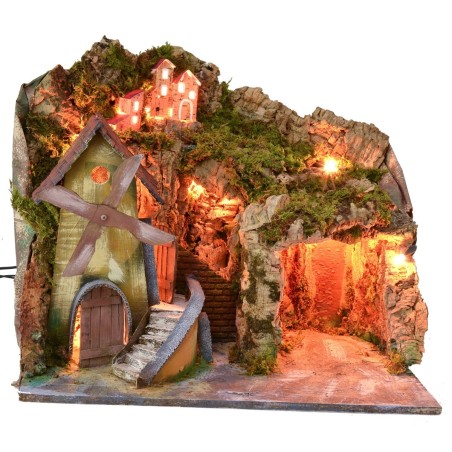 Classic illuminated landscape with grotto and mill running on