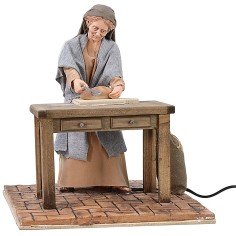 Mujer oriental que corta el pan en movimiento 30 cm Mundo