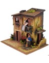 Pueblo iluminado para belén con doble movimiento de 40x30x35 cm