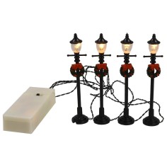 Coloca 4 farolas negras con guirnalda decorativa a batería de