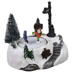 Escenario Navideño con pista de patinaje a baterías de