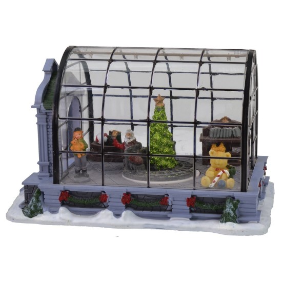 Invernadero con ambientación navideña y trineo de Papá Noel.