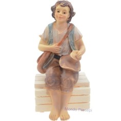 Sitting boy in resin series 10 cm