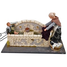 Lavandaia 30 cm con bambino con doppio movimento e fontana