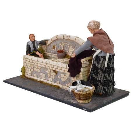 Lavandaia 30 cm con bambino con doppio movimento e fontana