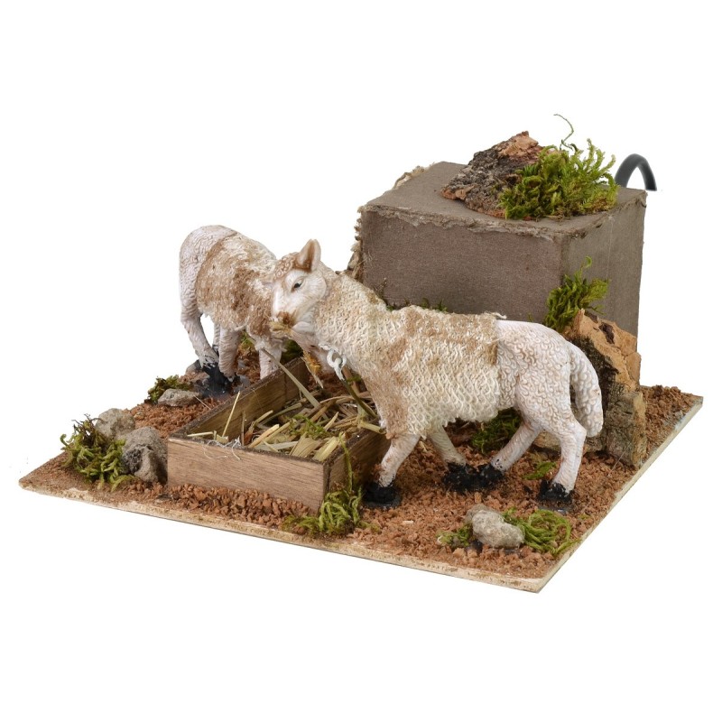 Pecore in movimento alla mangiatoia cm 15x15x8 h
