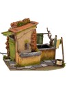 Casa con tendedero goteante y fuente funcionando de 25x21x21,5