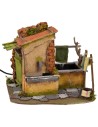 Casa con tendedero goteante y fuente funcionando de 25x21x21,5