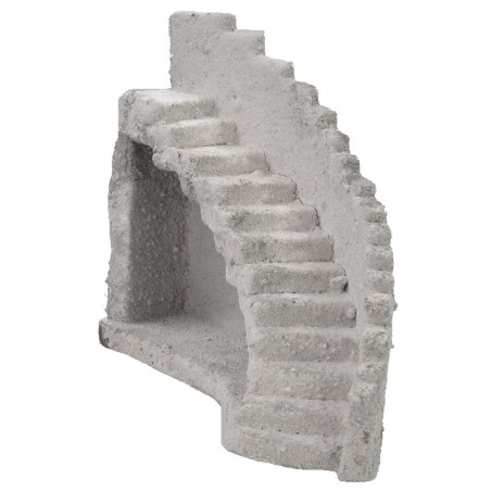 Fachada de antiguo castillo con escalera curva a la izquierda