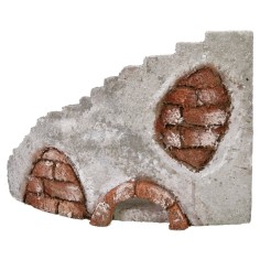 Fachada de un antiguo castillo con escalera curva a la izquierda cm