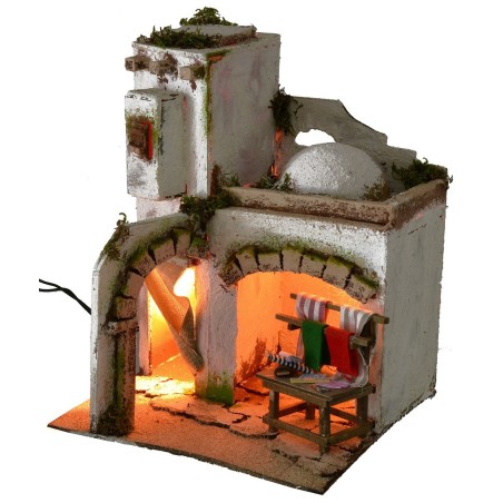 Casa araba illuminata con bottega della sarta cm 25x25x31,5 h