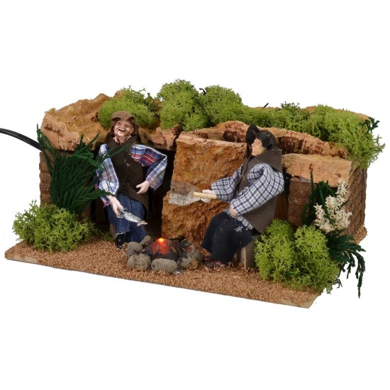 Two men on the move at the bivouac with fire effect